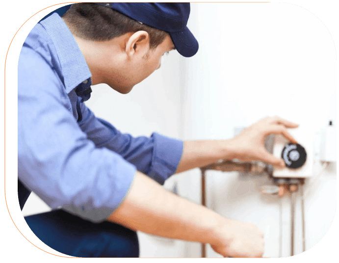 A man working on a pipe in the house